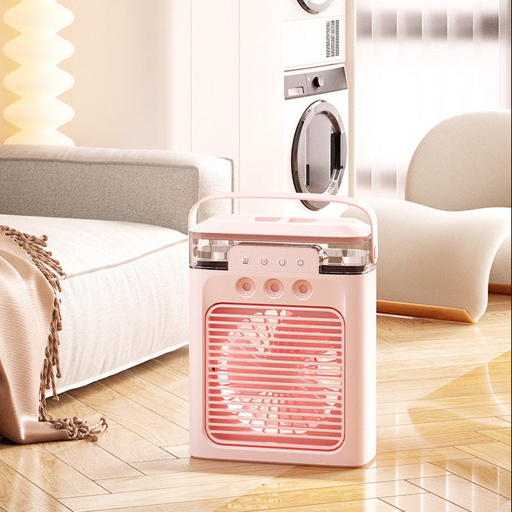 Pink portable heater on a wooden floor with a blurred background