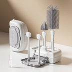Bottle cleaning brush set with stand and storage case on a beige background