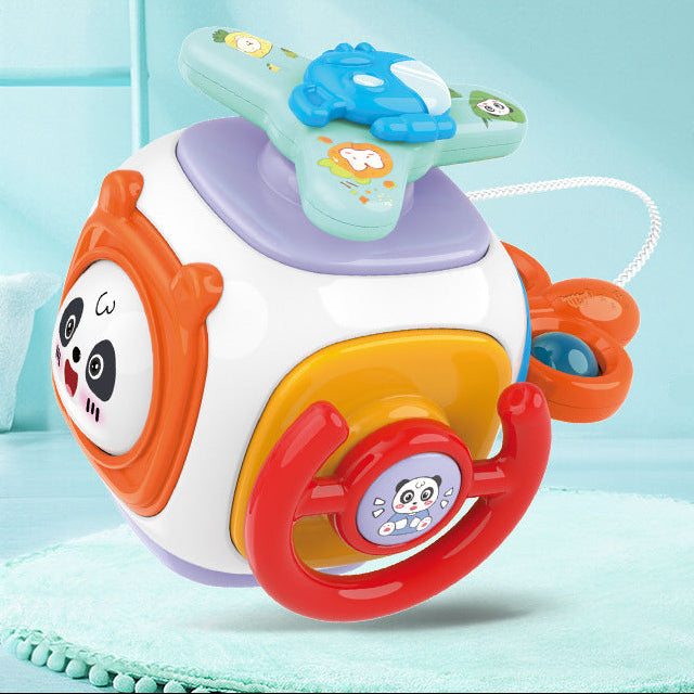 Colorful baby toy with panda design on a light blue background